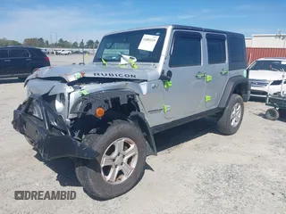 2008 Jeep Wrangler Unlimited Rubicon with VIN 1J4GA691X8L555097, listed as a IAAI auction lot 41889319 with 166,882 mi miles and . Bid and sale history available at DreamBid. Image 17.
