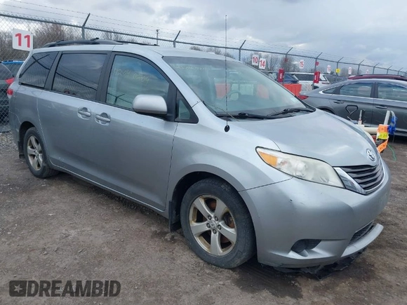 2011 Toyota Sienna LE AAS with VIN 5TDKK3DC8BS051934, listed as a IAAI auction lot 42040204 with 207,863 mi miles. Bid and sale history available at carsss.com. Image 1.
