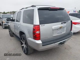 2011 Chevrolet Tahoe LS with VIN 1GNSCAE0XBR306224, listed as a IAAI auction lot 42332751 with 173,005 mi miles and . Bid and sale history available at DreamBid. Image 3.
