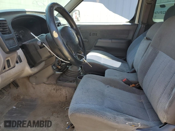 1999 Nissan Frontier XE with VIN 1N6DD26S3XC326231, listed as a Copart auction lot 51710615 with 228,174 mi miles and Salvage title. Bid and sale history available at DreamBid. Image 7.