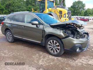 2019 Subaru Outback Touring with VIN 4S4BSATC3K3336155, listed as a IAAI auction lot 42499358 with 100,409 mi miles and . Bid and sale history available at DreamBid. Image 1.