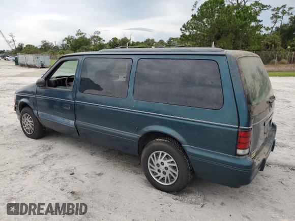 1995 Dodge Caravan Grand SE z VIN 1B4GH44R8SX633988, wystawiony jako Copart lot #65667454 z przebiegiem 121 183 mil mil oraz Czysty tytuł • Clean title. Historia ofert i sprzedaży dostępna na DreamBid. Obrazek 2.