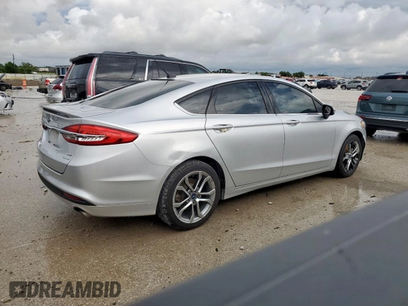 2017 Ford Fusion SE with VIN 3FA6P0HDXHR170848, listed as a Copart auction lot 54949075 with 156,218 mi miles and Salvage title. Bid and sale history available at DreamBid. Image 3.