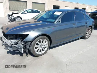 2014 Audi A6 3.0T Prestige with VIN WAUHGAFC9EN028196, listed as a IAAI auction lot 41993806 with 100,215 mi miles. Bid and sale history available at carsss.com. Image 19.