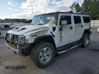 2003 Hummer H2 z VIN 5GRGN23U93H112262, wystawiony jako Copart lot #74209544 z przebiegiem Nie podano mil oraz Szkody całkowita. Historia ofert i sprzedaży dostępna na DreamBid. Obrazek 1.