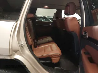 2015 Jeep Grand Cherokee Summit with VIN 1C4RJFJG5FC918837, listed as a IAAI auction lot 41126436 with 155,516 mi miles. Bid and sale history available at carsss.com. Image 8.