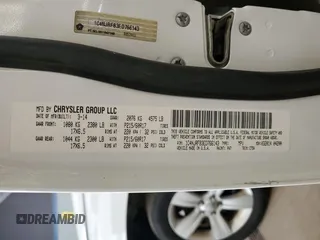 2014 Jeep Patriot Latitude with VIN 1C4NJRFB3ED766143, listed as a Copart auction lot 57879215 with 145,733 mi miles and Clean title. Bid and sale history available at DreamBid. Image 13.