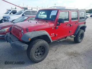 2007 Jeep Wrangler Unlimited X with VIN 1J4GA39197L171132, listed as a IAAI auction lot 41716963 with 145,442 mi miles and . Bid and sale history available at DreamBid. Image 22.