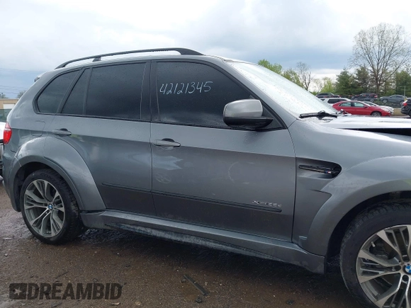 2011 BMW X5 35d z VIN 5UXZW0C52BL661879, wystawiony jako IAAI lot #42121345 z przebiegiem 131 036 mil mil oraz . Historia ofert i sprzedaży dostępna na DreamBid. Obrazek 13.