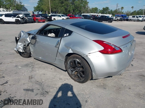 2017 Nissan 370Z with VIN JN1AZ4EHXHM951104, listed as a IAAI auction lot 41992380 with 118,356 mi miles. Bid and sale history available at carsss.com. Image 3.