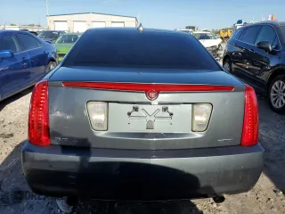 2009 Cadillac STS RWD z VIN 1G6DW67V390104597, wystawiony jako Copart lot #73794724 z przebiegiem Nie podano mil oraz Szkoda całkowita • Salvage title. Historia ofert i sprzedaży dostępna na DreamBid. Obrazek 6.