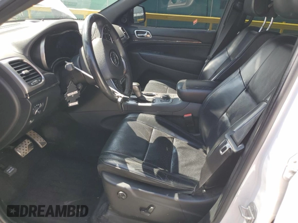 2018 Jeep Grand Cherokee High Altitude with VIN 1C4RJFCT9JC293653, listed as a Copart auction lot 58833145 with 96,808 mi miles and Salvage title. Bid and sale history available at DreamBid. Image 7.
