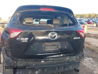 2015 Mazda CX-5 Grand Touring with VIN JM3KE4DY6F0513173, listed as a IAAI auction lot 41867030 with 93,770 mi miles. Bid and sale history available at carsss.com. Image 16.