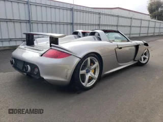2004 Porsche Carrera GT z VIN WP0CA29894L001019, wystawiony jako Copart lot #52988584 z przebiegiem 4486 mil mil oraz Szkody całkowita. Historia ofert i sprzedaży dostępna na DreamBid. Obrazek 3.
