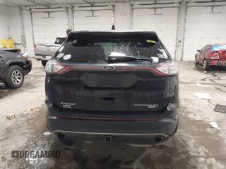 2015 Ford Edge Titanium z VIN 2FMTK4K91FBB27482, wystawiony jako IAAI lot #41919347 z przebiegiem 177 268 mil mil oraz . Historia ofert i sprzedaży dostępna na DreamBid. Obrazek 16.