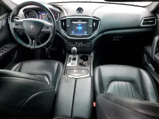2016 Maserati Ghibli z VIN ZAM57XSA2G1175656, wystawiony jako Copart lot #44798125 z przebiegiem 105 496 mil mil oraz Szkody całkowita. Historia ofert i sprzedaży dostępna na DreamBid. Obrazek 8.