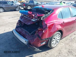 2019 Toyota Camry LE with VIN 4T1B11HK1KU233345, listed as a IAAI auction lot 41971136 with 51,499 mi miles and . Bid and sale history available at DreamBid. Image 6.