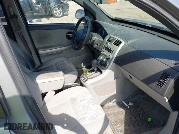 2006 Chevrolet Equinox LS z VIN 2CNDL13F266060436, wystawiony jako IAAI lot #42380581 z przebiegiem 129 639 mil mil oraz . Historia ofert i sprzedaży dostępna na DreamBid. Obrazek 5.