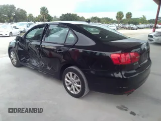 2011 Volkswagen Jetta Sedan SE with VIN 3VWDX7AJ7BM390282, listed as a IAAI auction lot 41673478 with 196,094 mi miles. Bid and sale history available at carsss.com. Image 3.