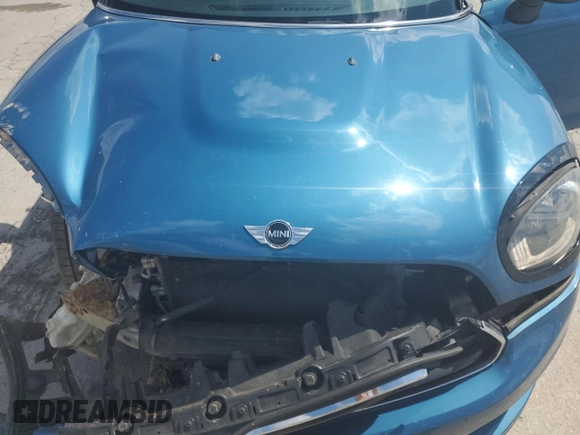 2018 MINI Countryman Cooper with VIN WMZYS7C36J3E08906, listed as a Copart auction lot 56538115 with 129,473 mi miles and Salvage title. Bid and sale history available at DreamBid. Image 11.