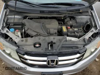 2014 Honda Odyssey LX z VIN 5FNRL5H21EB106600, wystawiony jako Copart lot #57875765 z przebiegiem 122 159 mil mil oraz Szkoda całkowita • Salvage title. Historia ofert i sprzedaży dostępna na DreamBid. Obrazek 12.