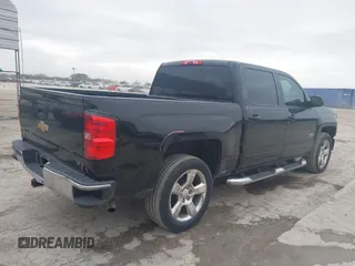 2015 Chevrolet Silverado 1500 LT with VIN 3GCPCREC0FG412551, listed as a IAAI auction lot 41577706 with 156,318 mi miles and . Bid and sale history available at DreamBid. Image 4.