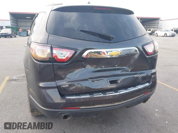 2015 Chevrolet Traverse LTZ with VIN 1GNKVJKDXFJ206159, listed as a IAAI auction lot 41762515 with 143,062 mi miles and . Bid and sale history available at DreamBid. Image 6.
