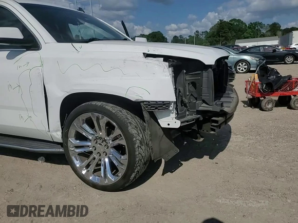 2015 GMC Yukon XL SLE z VIN 1GKS1GKC6FR152038, wystawiony jako Copart lot #54730265 z przebiegiem 142 696 mil mil oraz Szkoda całkowita • Salvage title. Historia ofert i sprzedaży dostępna na DreamBid. Obrazek 13.