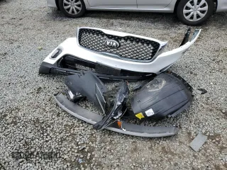 2017 Kia Sorento EX z VIN 5XYPH4A57HG301802, wystawiony jako Copart lot #55183885 z przebiegiem 128 064 mil mil oraz Szkoda całkowita • Salvage title. Historia ofert i sprzedaży dostępna na DreamBid. Obrazek 13.