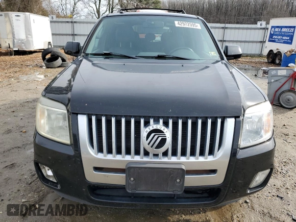 2009 Mercury Mariner Premier z VIN 4M2CU87719KJ20338, wystawiony jako Copart lot #42972595 z przebiegiem 148 871 mil mil oraz Szkoda całkowita • Salvage title. Historia ofert i sprzedaży dostępna na DreamBid. Obrazek 5.