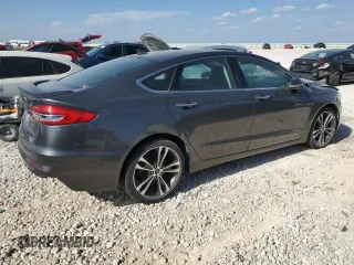 2019 Ford Fusion Titanium with VIN 3FA6P0D98KR141499, listed as a Copart auction lot 49250385 with 0 mi miles and Clean Title. Bid and sale history available at carsss.com. Image 3.
