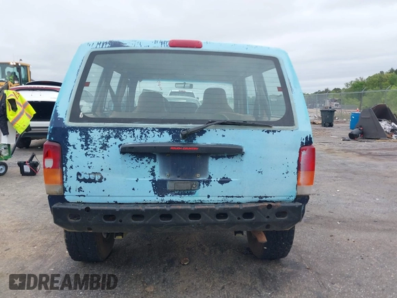 1997 Jeep Cherokee SE z VIN 1J4FJ28S3VL573144, wystawiony jako IAAI lot #41965201 z przebiegiem 298 276 mil mil oraz . Historia ofert i sprzedaży dostępna na DreamBid. Obrazek 16.