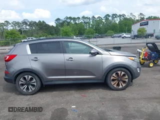 2013 Kia Sportage SX with VIN KNDPCCA62D7506937, listed as a IAAI auction lot 41967245 with 110,151 mi miles and . Bid and sale history available at carsss.com. Image 13.