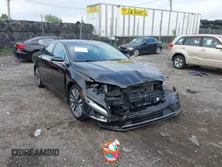 2019 Lincoln MKZ Hybrid Reserve II with VIN 3LN6L5MU4KR603866, listed as a IAAI auction lot 42747164 with 59,536 mi miles and . Bid and sale history available at DreamBid. Image 1.