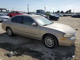 2000 Nissan Maxima GXE z VIN JN1CA31D0YT712485, wystawiony jako Copart lot #54956875 z przebiegiem 187 942 mil mil oraz Czysty tytuł • Clean title. Historia ofert i sprzedaży dostępna na DreamBid. Obrazek 4.