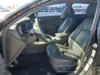 2015 Kia Optima SX Turbo with VIN 5XXGR4A6XFG454049, listed as a Copart auction lot 52217185 with 115,675 mi miles and Salvage Title. Bid and sale history available at carsss.com. Image 7.