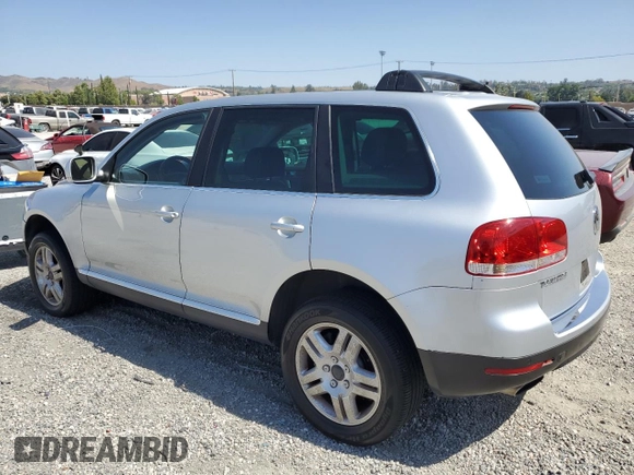 2005 Volkswagen Touareg z VIN WVGCM77L95D014940, wystawiony jako Copart lot #60156795 z przebiegiem 114 551 mil mil oraz Czysty tytuł • Clean title. Historia ofert i sprzedaży dostępna na DreamBid. Obrazek 2.