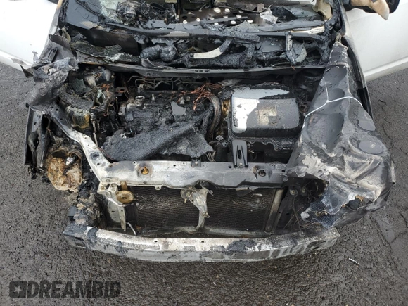 2004 Toyota Prius with VIN JTDKB22U040045296, listed as a Copart auction lot 52336425 with Not Provided miles and Non Repairable. Bid and sale history available at DreamBid. Image 12.