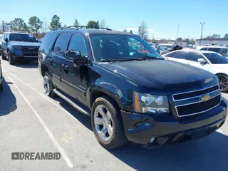 2014 Chevrolet Tahoe LT z VIN 1GNSCBE00ER199727, wystawiony jako IAAI lot #41737576 z przebiegiem 171 671 mil mil oraz . Historia ofert i sprzedaży dostępna na DreamBid. Obrazek 1.