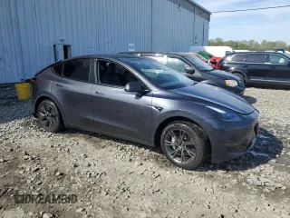 2024 Tesla Model Y Long Range with VIN 7SAYGDEE7RA307013, listed as a Copart auction lot 54767595 with 12,953 mi miles and Salvage Title. Bid and sale history available at DreamBid. Image 4.