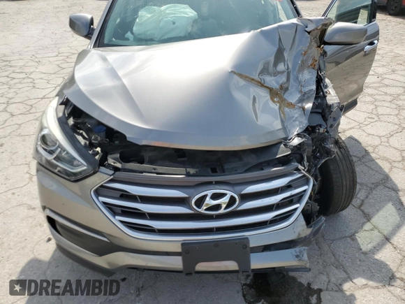 2018 Hyundai Santa Fe 2.4L z VIN 5NMZTDLB9JH079656, wystawiony jako Copart lot #54256175 z przebiegiem 100 678 mil mil oraz Szkoda całkowita • Salvage title. Historia ofert i sprzedaży dostępna na DreamBid. Obrazek 12.