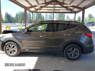 2014 Hyundai Santa Fe z VIN 5XYZUDLB0EG187192, wystawiony jako IAAI lot #42360255 z przebiegiem 154 607 mil mil oraz . Historia ofert i sprzedaży dostępna na DreamBid. Obrazek 14.