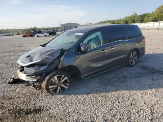 2021 Honda Odyssey Touring z VIN 5FNRL6H85MB012325, wystawiony jako Copart lot #53367115 z przebiegiem Nie podano mil oraz Szkoda całkowita • Salvage title. Historia ofert i sprzedaży dostępna na DreamBid. Obrazek 1.