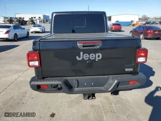 2023 Jeep Gladiator Overland with VIN 1C6HJTFG2PL559314, listed as a Copart auction lot 87530945 with 9,434 mi miles and Salvage Title. Bid and sale history available at carsss.com. Image 6.