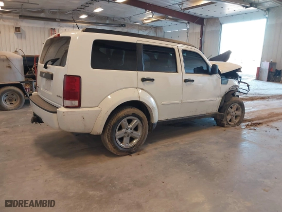 2008 Dodge Nitro SXT with VIN 1D8GU28K48W272971, listed as a IAAI auction lot 41774435 with 225,071 mi miles. Bid and sale history available at carsss.com. Image 4.