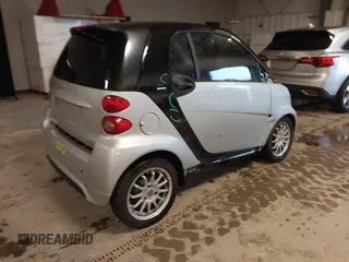 2014 Smart fortwo Pure with VIN WMEEJ3BA1EK728739, listed as a IAAI auction lot 41911785 with 120,688 mi miles and . Bid and sale history available at DreamBid. Image 4.