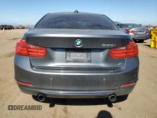 2015 BMW 3 Series 335i with VIN WBA3A9C57FK473104, listed as a Copart auction lot 54974185 with 112,370 mi miles and Salvage title. Bid and sale history available at DreamBid. Image 6.