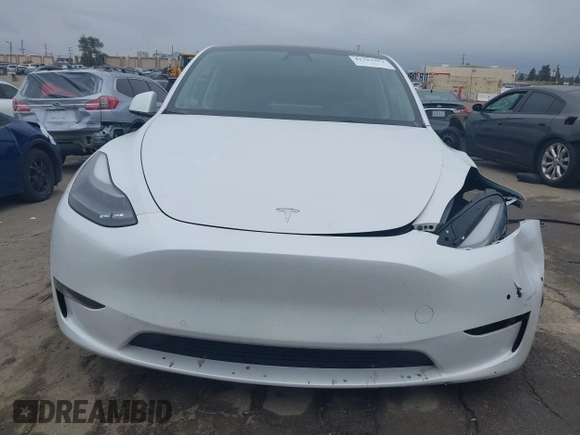2022 Tesla Model Y Performance with VIN 7SAYGDEF0NF400560, listed as a IAAI auction lot 41783912 with 36,513 mi miles and . Bid and sale history available at DreamBid. Image 12.