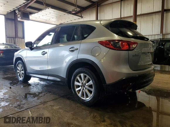 2014 Mazda CX-5 Touring z VIN JM3KE4CY5E0393463, wystawiony jako Copart lot #57776665 z przebiegiem 91 565 mil mil oraz Szkoda całkowita • Salvage title. Historia ofert i sprzedaży dostępna na DreamBid. Obrazek 2.