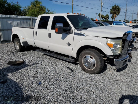 2015 Ford F-350 Lariat with VIN 1FT8W3CT0FEA68755, listed as a Copart auction lot 62486445 with 222,990 mi miles and Salvage title. Bid and sale history available at DreamBid. Image 4.